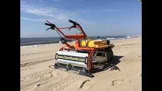 Beach Cleaning - sifting beach sand clean with the Barracuda beach cleaner