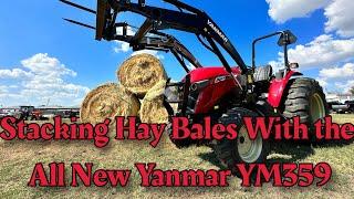 Stacking Hay Bales WIth the All New Yanmar YM359