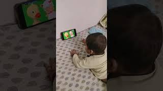 Abhineet watching kids song