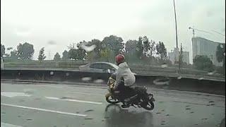 Narrow Escape For Motorcyclist After Crashing On Highway