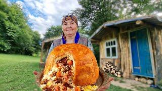 Cooking Pilaf With Meat and Dried Fruits Inside the Dough.