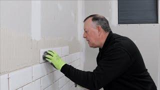 How to tile a wall