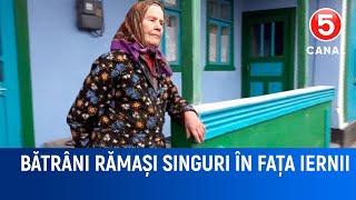 Bătrâni rămași singuri în fața iernii