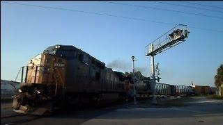 CSX Long Mixed Freight Train Screams Along Curve