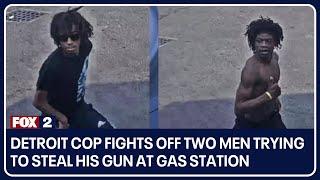 Detroit cop fights off two men trying to steal his gun at gas station