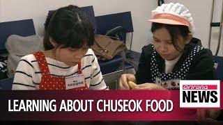 Multicultural families experience Korean Chuseok food tradition