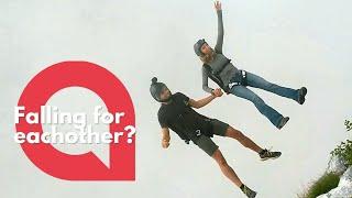 A pair of flying friends filmed themselves free falling from a cliff face hand in hand | SWNS