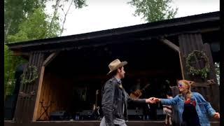 Okie From Muskogee by Merle Haggard.  My brother Kyle took this at the Firefly Stage at NCF 2022.