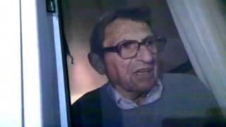 Joe Paterno talks from Window to Mob outside his home.