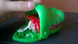 How does the Crocodile Dentist Toy works?