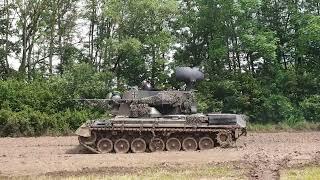 Leopard 1 and 2 tanks, Marder Aifv,  Gepard flakpanzer and bergepanzer through the mud.