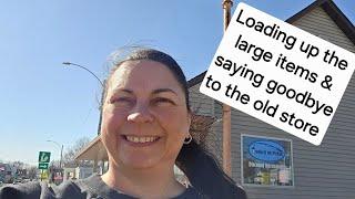 Loading the large items on a moving truck and saying goodbye to the old store