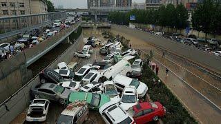 Chinese city picks through the debris after record rains kill at least 33 • FRANCE 24 English