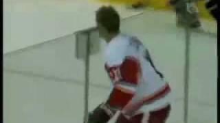 Robin Regehr smashes Dan Cleary