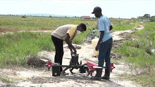 GLOBALink | Ugandan youth receive drone pilot training on Chinese-run rice farm