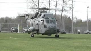 Cool Sea King Helicopter lifts off in soccer field