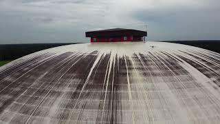 How to clean a dome roof with a spraying drone