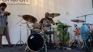 Dana Hawkins playing drums at a drum event Hosted By: @HazeAmaze