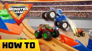 Jump over Monster Jam trucks with booster power! Here’s how to assemble the Supercharge Speedway!