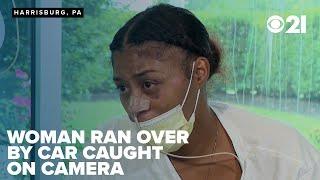 Caught on camera: Woman ran over by car