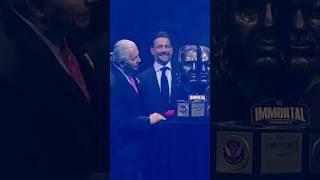 CM Punk welcomes out Bret Hart and Steve Austin to receive the first-ever “WWE Immortal Moment”