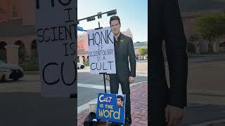 Tom Cruise protesting Scientology!