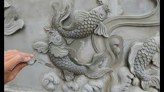 Make a bas-relief of a pair of carp / cement sand / lifelike beautiful