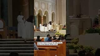 Nativity's Sisters bring up the Gifts during Mass at the National Shrine in Washington, D.C.