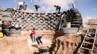 Man Build Eco House use Recycle Car Tyres - Building Earthship by Straw Bale & Rammed Earth Method