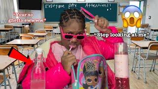 Ghetto black Barbie comes to school in all pink…