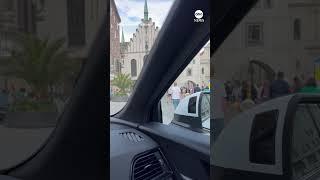 American tourists drive through pedestrian area in Munich