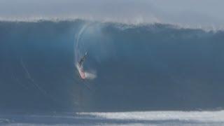 British surfer Tom Lowe rides one of the world's most dangerous waves