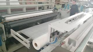 Automated industrial maxi roll tissue paper rewinding cutting machine