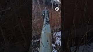 Ukrainians casually walk past massive unexploded bomb in Avdiivka