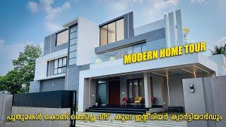 പുതുമകൾ കൊണ്ട് ഞെട്ടിച്ച വീട് | Modern Home Tour | Trending Wall Panelings | Charcol sheet