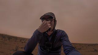 In a Sandstorm Bikepacking in Algeria. Also Algerian Pizza Review