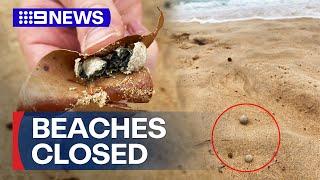 Nine Sydney beaches closed as mysterious ball-shaped debris washes up | 9 News Australia