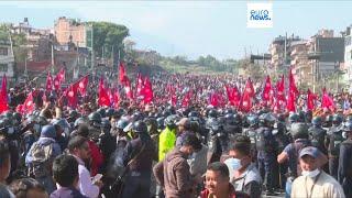 Clashes in Nepal: crowd faces Riot Police in Kathmandu demanding restoration of the monarchy