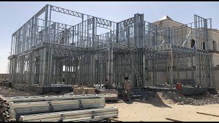 Light gauge steel frame building with lightweight concrete infill