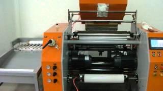 Fully automatic stretch film rewinder