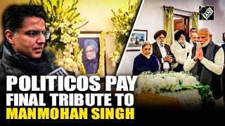 Political stalwarts pay their last tribute to Manmohan Singh at his residence