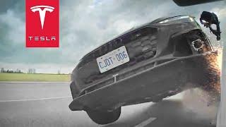 AUDI FLIPS UP ON TWO WHEELS AND DESTROYS TESLA