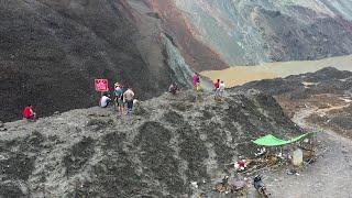 Mass burial for scores killed in Myanmar jade mine disaster | AFP