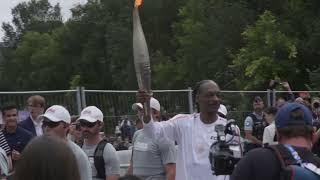 Snoop Dogg carries Olympic torch in Saint-Denis