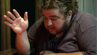 Hugo (Jorge Garcia) cries reading his script for Lost