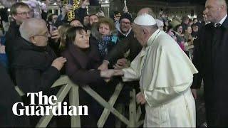 Indignant Pope Francis slaps woman's hand to free himself at New Year's Eve gathering