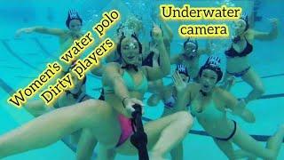 Women's Water Polo Ditty players Underwater.