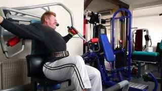 Michael Gundill performs upper chest' superset on machines