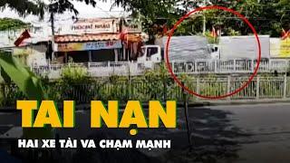 Hai xe tải va chạm mạnh, một đoạn lan can văng xuống kênh ở quận Tân Phú