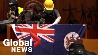 Protesters hang 'Union Jack' flag inside Hong Kong legislature